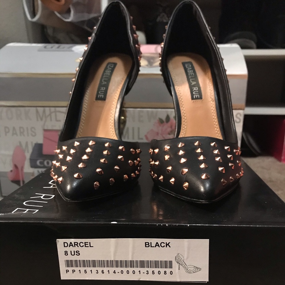 Izabella Rue heels with rose gold spikes.